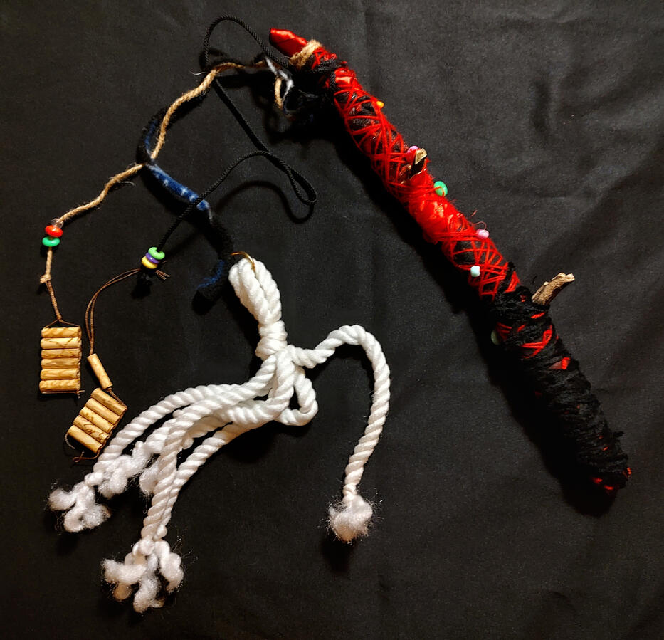 Which cat? An extremely elaborate and colorful fishing rod style cat toy.